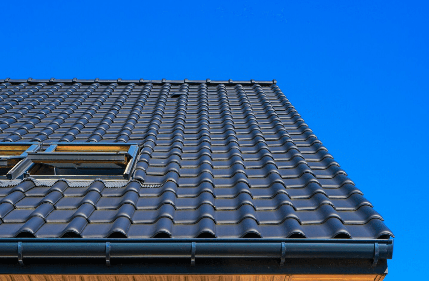 A close-up of a roof with asphalt shingles.